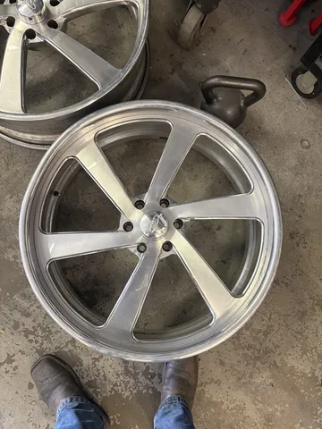 A second 26-inch billet Intro wheel with a bent barrel before straightening
